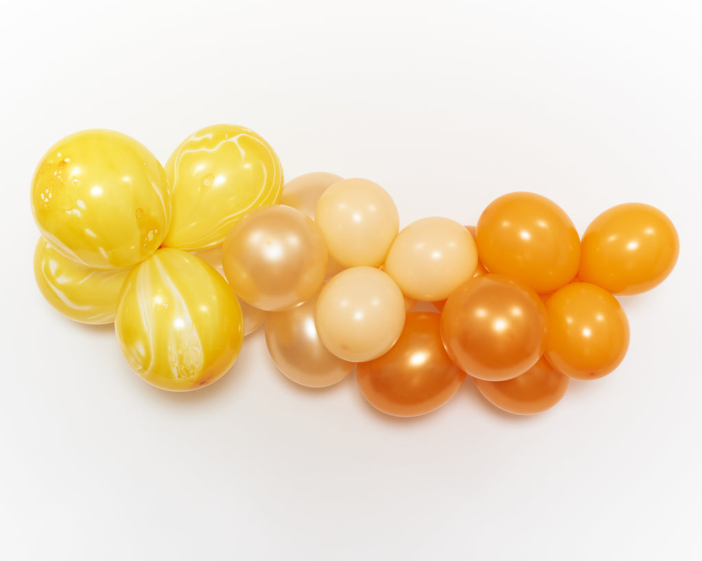Ballongirlande in Gelb- und Orangetönen